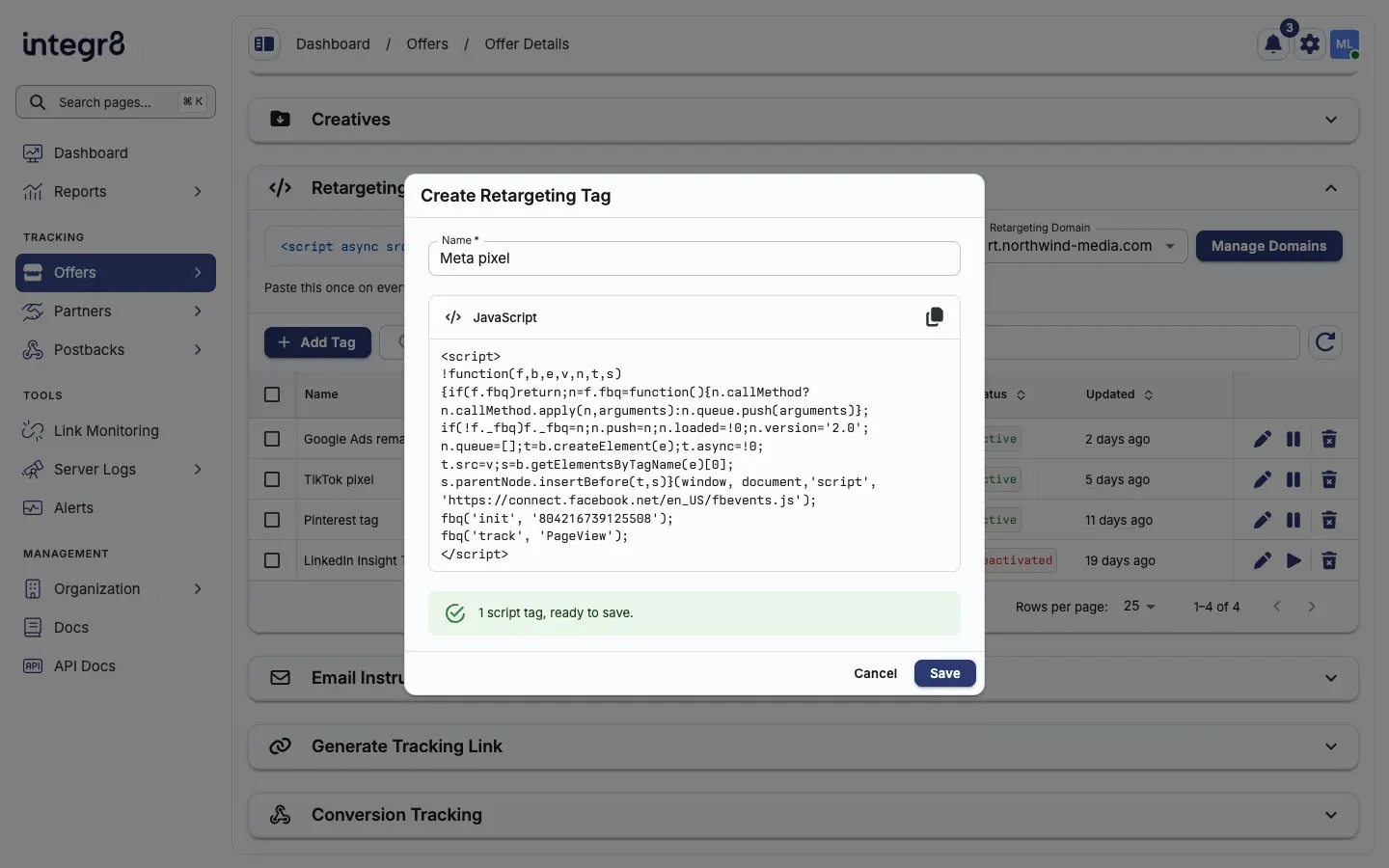 The Create Retargeting Tag dialog with a Meta pixel pasted into the code editor and its status below